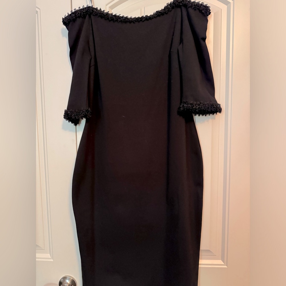 Great little Black dress! Fitted with stretch and fully lined so no lines! XL
